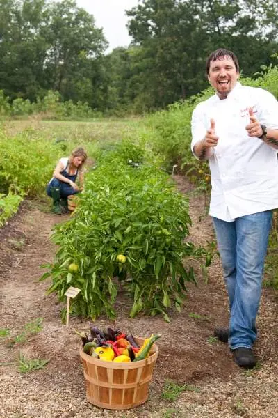 The owners of Firefly Grill busy collecting crops