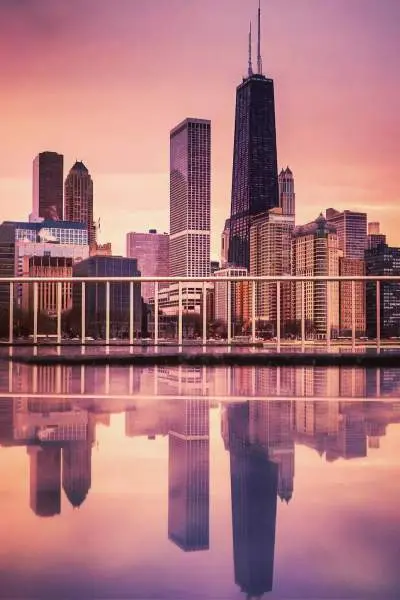 Sunset with chicagos skyline and lake michigan