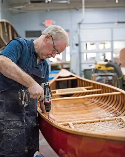 Man crafting a boat