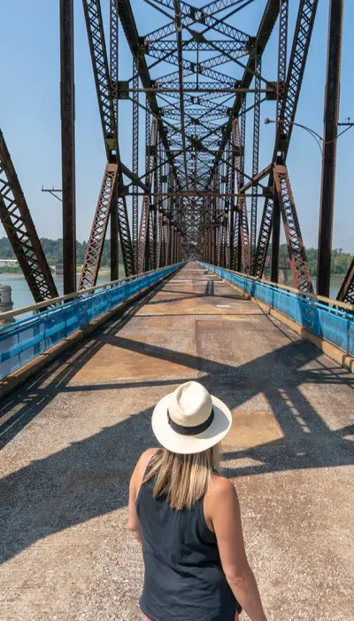 Woman looking at the chain of Rocks bridge.